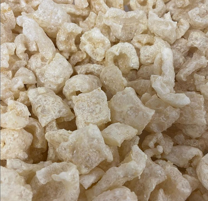 Close-up of Louis Pasture pork crisps showing crispy golden texture, the best value case of 15 keto paleo carnivore snack handmade in British Columbia